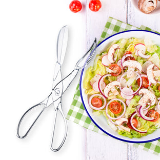 Plastic salad tongs with a scissor design added convenience to serving stations.