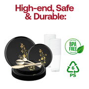 Plated salad and dessert served on matching black and gold plastic plates with gold utensils