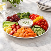 Product dimensions for 14 inch white round plastic tray, showing the oversized diameter for grand event catering and food service