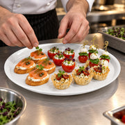 Product size dimensions for 16 inch white round plastic tray, showing the jumbo diameter for massive event catering and food service