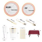 Red and gold chord rim plates placed on a burgundy table with gold-accented tumblers.