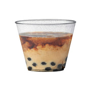 Round 9 oz clear plastic cups with silver glitter, great for serving cocktails, soda, juice, and sparkling drinks