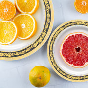 Royal Rim Salad Plates in black and gold were used to serve appetizers at a formal black-tie event.