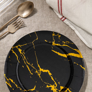 Scene from a party setup showing Black with Gold Marble Round   Charger Plates (13