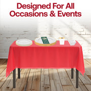 Seasonal decor elevated with the Ho-Ho Haute plates and gold-toned flatware.