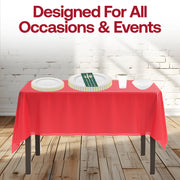 Seasonal decor elevated with the Ho Ho Haute plates and gold-toned flatware.