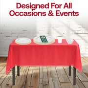 Seasonal decor elevated with the Ho Ho Haute plates and gold-toned flatware