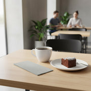 Shimmering Silver Paper Dinner Napkins ideal for parties, receptions, and catered events.