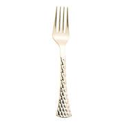 The Shiny Gold Glamour Cutlery Disposable Plastic Forks feature a shiny, gold-colored design with a textured, hammered handle. This elegant party cutlery boasts four tines and a slightly rounded tip at the end of the handle. The pattern of small indentations gives it a unique and sophisticated appearance. The background is plain white.