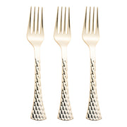 Three Shiny Gold Glamour Cutlery Disposable Plastic Forks with a textured, hammered design on the handles are displayed vertically, side by side, against a plain white background. The forks have four tines each and a shiny, reflective finish. Perfect as elegant party cutlery, these utensils add a touch of luxury to any event.