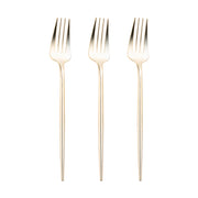 Three identical Shiny Gold Moderno Disposable Plastic Dessert Forks are arranged vertically in a row on a plain white background. These elegant dessert forks feature a sleek, modern design with long, tapered handles and four tines each.