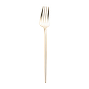 A sleek Shiny Gold Moderno Disposable Plastic Dinner Fork with four tines is displayed vertically against a white background. Its shiny gold finish complements the minimalistic and elegant design, showcasing a long, slender handle that tapers slightly towards the neck.