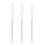 Three Moderno Disposable Plastic Dinner Knives with a silver design and white handles are lined up vertically side by side against a white background.