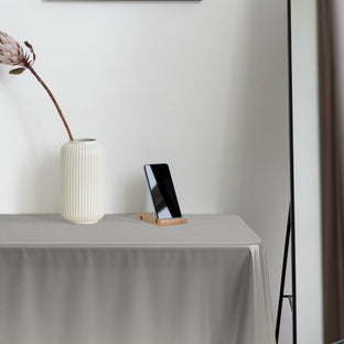 Silver Rectangular Tablecloths gave table settings a sparkling touch for upscale parties.