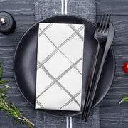Silver diamond dinner napkins placed at an elegant wedding table, enhancing the sophisticated décor