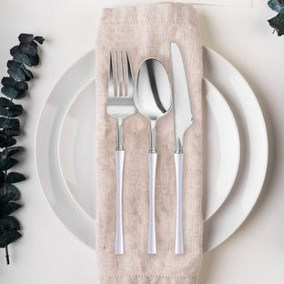 Silver disposable plastic cutlery set with elegant white handles, featuring 8.4