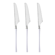 Silver disposable plastic dinner knives measuring 8.8" with white handles, perfect for dining and serving at special occasions.