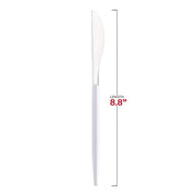 Silver disposable plastic dinner knives measuring 8.8" with white handles, perfect for dining and serving at special occasions