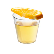 Small 1 oz clear plastic shot glasses, disposable and durable, perfect for events, tastings, and celebrations