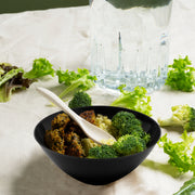 Solid Black Organic Round Disposable Plastic Bowl (100 oz.) filled with broccoli, rice, and grilled meat for a hearty meal.