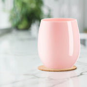 Solid Pink Elegant Stemless Plastic Wine Glass with a soft pastel tone and smooth finish, perfect for events