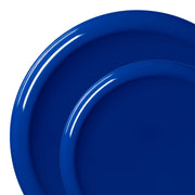 Solid blue flat round disposable plastic dinnerware set featuring 120 dinner plates and 120 salad plates, ideal for vibrant event settings