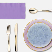 Sophisticated birthday dinner captured with guests seated at a themed Parisian table.