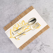 Sophisticated gold antique floral napkins in white paper, perfect for weddings, banquets, and formal gatherings