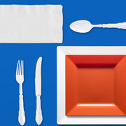 Sports gathering enhanced by a bright, colorful setup using the Proud Fan Dinnerware Set.