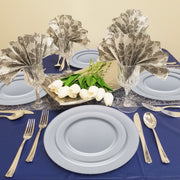 Steel gray 7.5" salad plates displayed on a bold dinner setup with cool-toned details and minimalist tableware
