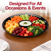 Stylish black party trays coordinate easily with metallic cutlery and plates, creating a cohesive, polished presentation.