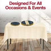Stylish holiday table with the Resting Grinch Face Sets navy plates and gold flatware.