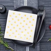 Stylish white paper beverage napkins with metallic gold dots, ideal for adding a festive touch to any occasion