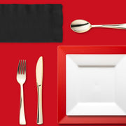 Tailgate tables shine with coordinated red, black, and gold pieces that scream premium fan spirit.