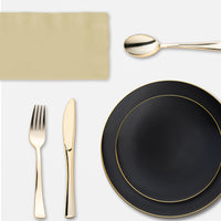 Tailgating made chic with a black and gold themed table spread featuring disposable elegance.