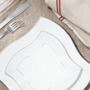 The Clear Wave Plastic Wedding Set provides perfectly sized plates, cutlery, and cups to serve guests elegantly