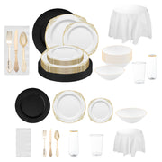 The Hollywood Hangover Package arranged with black chargers, gold flatware, and white tablecloths for a glamorous wedding.