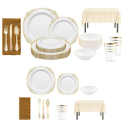 The Jingle Bells Set placed on a holiday table with gold fancy plates and glittering gold napkins.