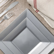 The Silver Square Plastic Wedding Set offers impeccably sized plates and utensils to elevate lavish events and large celebrations