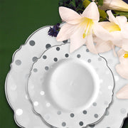 The White with Silver Dots Round Blossom Disposable Plastic Wedding Value Set is thoughtfully designed to offer the ideal size and quantity, ensuring your event is perfectly equipped with refined tableware