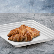 These 16" x 16" trays helped organize and display snacks at a coordinated buffet.