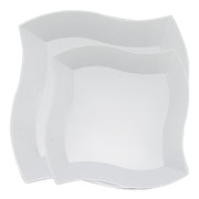 This sophisticated dinnerware set showcases white plastic plates with a unique wave pattern, perfect for any occasion