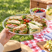 Top-down view of a 14-inch tray with cupcakes and finger foods—perfect for birthdays and holidays