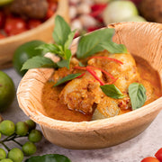 Upscale buffet featuring Oval Palm Leaf Bowls — a refined, natural alternative to plastic at weddings and events