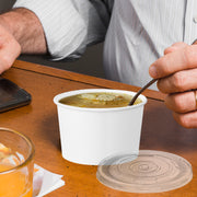 Use these versatile 6 oz Squat Paper Soup Cups as dessert cups for ice cream, parfaits, or fruit at weddings and holiday events