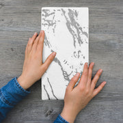 Versatile white napkins with silver marble pattern enhance dinner tables at corporate events and private parties