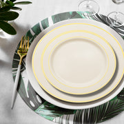 Versatile white plastic plates with an elegant silver rim, ideal for both casual and formal dining experiences.