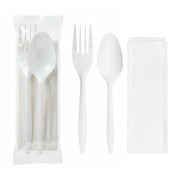 White MW cutlery kit with fork, teaspoon, and napkin, individually wrapped disposable utensil set for grab-and-go and boxed lunch service.
