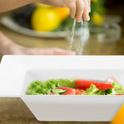 White Square Plastic Soup Bowl (12 oz.) served with fresh lettuce and tomatoes in a bright kitchen setting