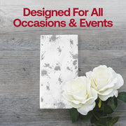 White and silver paper dinner napkins enhance birthdays, banquets, and all special occasions with subtle style